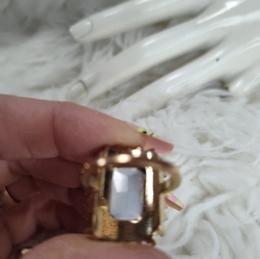 Large pink 3ct cubic zirconia with clear round cubic zirconia gold ring size 6